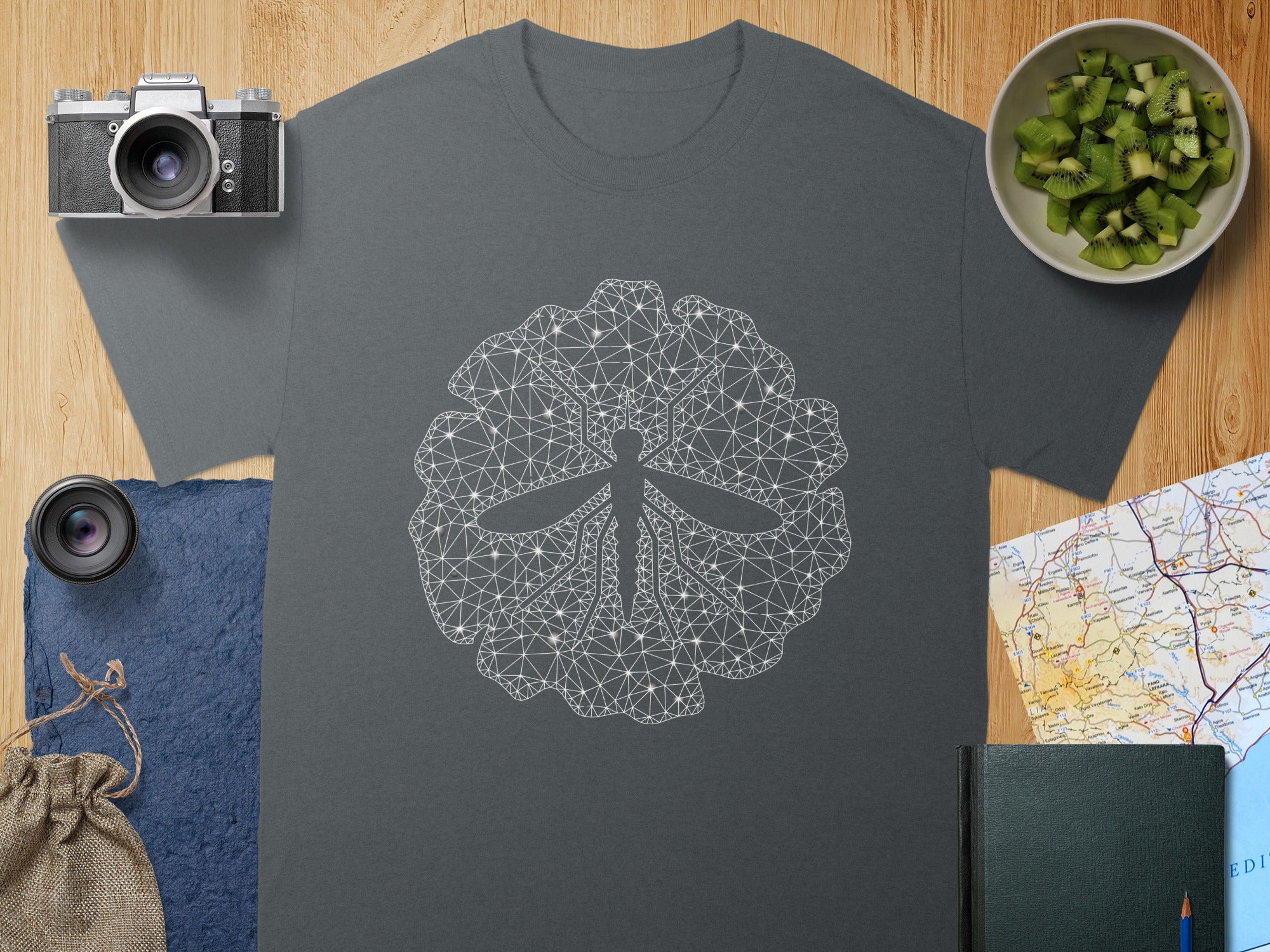 Dark gray t-shirt with an abstract white geometric dragonfly design.
