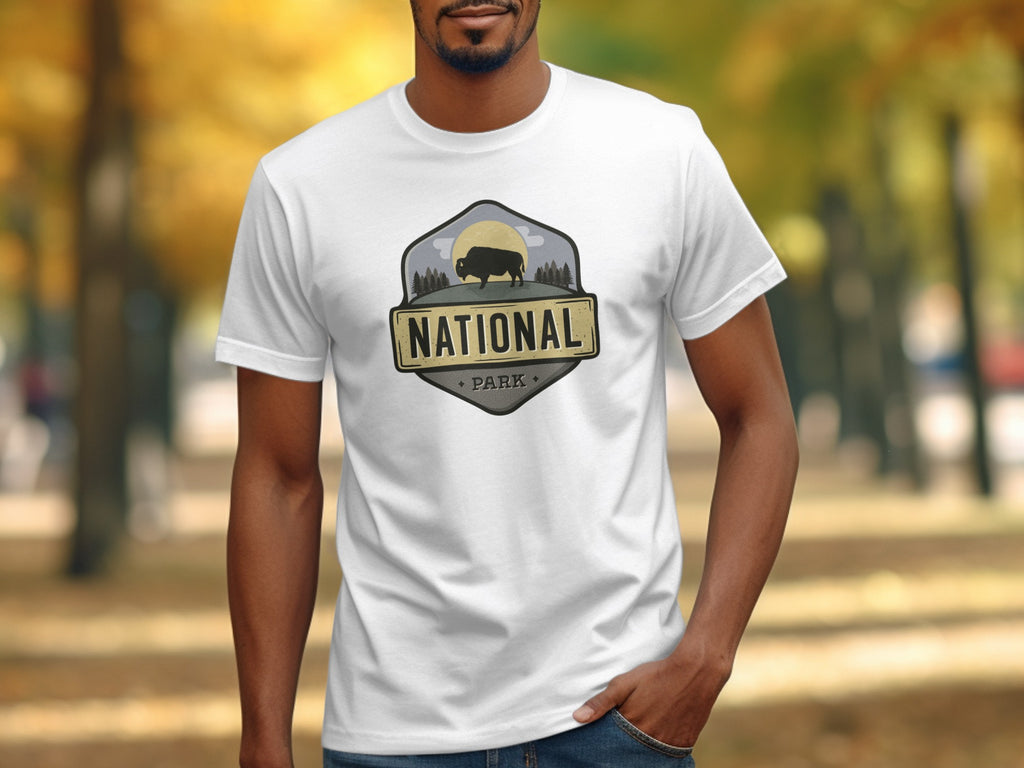 White t-shirt with "National Park" graphic featuring a bison and sun.
