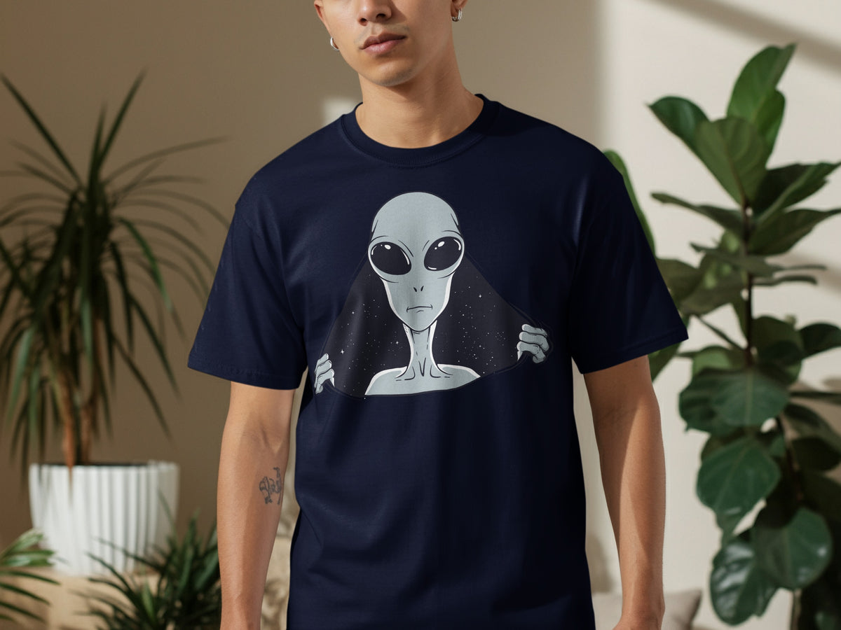 Navy t-shirt with a gray alien peeking out from a starry space background.