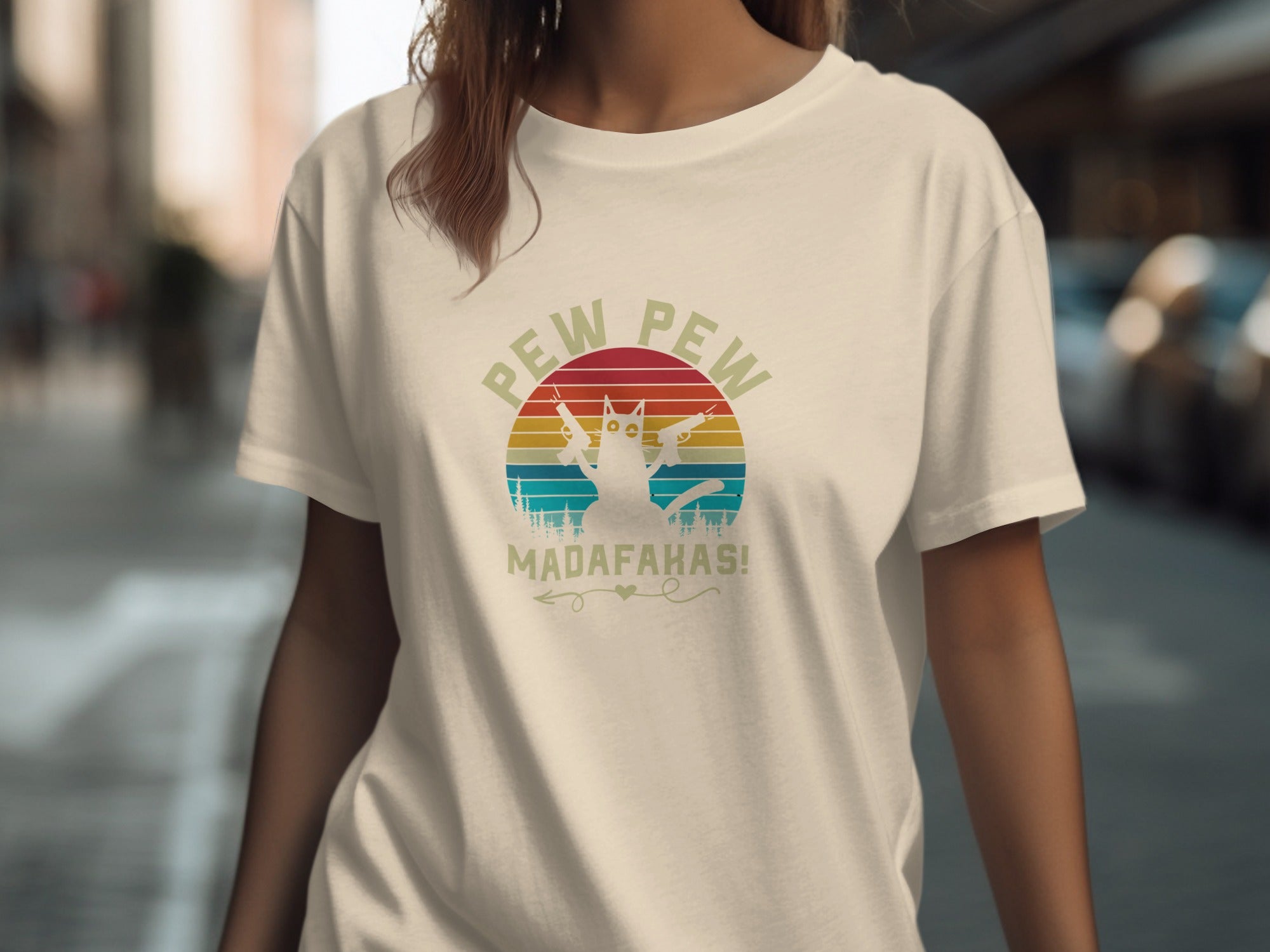 T-shirt with a graphic of a cat holding two guns with "PEW PEW MADAFalkas!" text.
