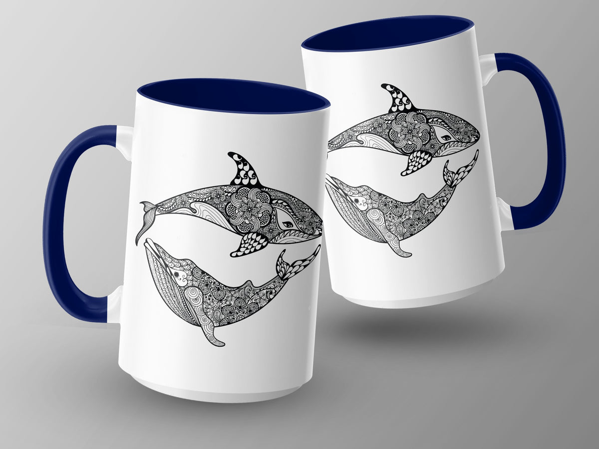 Two white mugs with blue handles feature black line art of whales and orcas with intricate patterns.