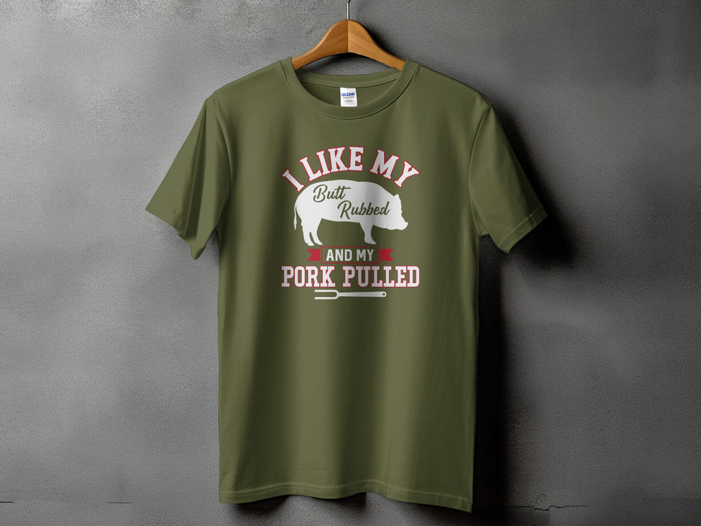Green t-shirt with text "I LIKE MY Butt Rubbed AND MY PORK PULLED".
