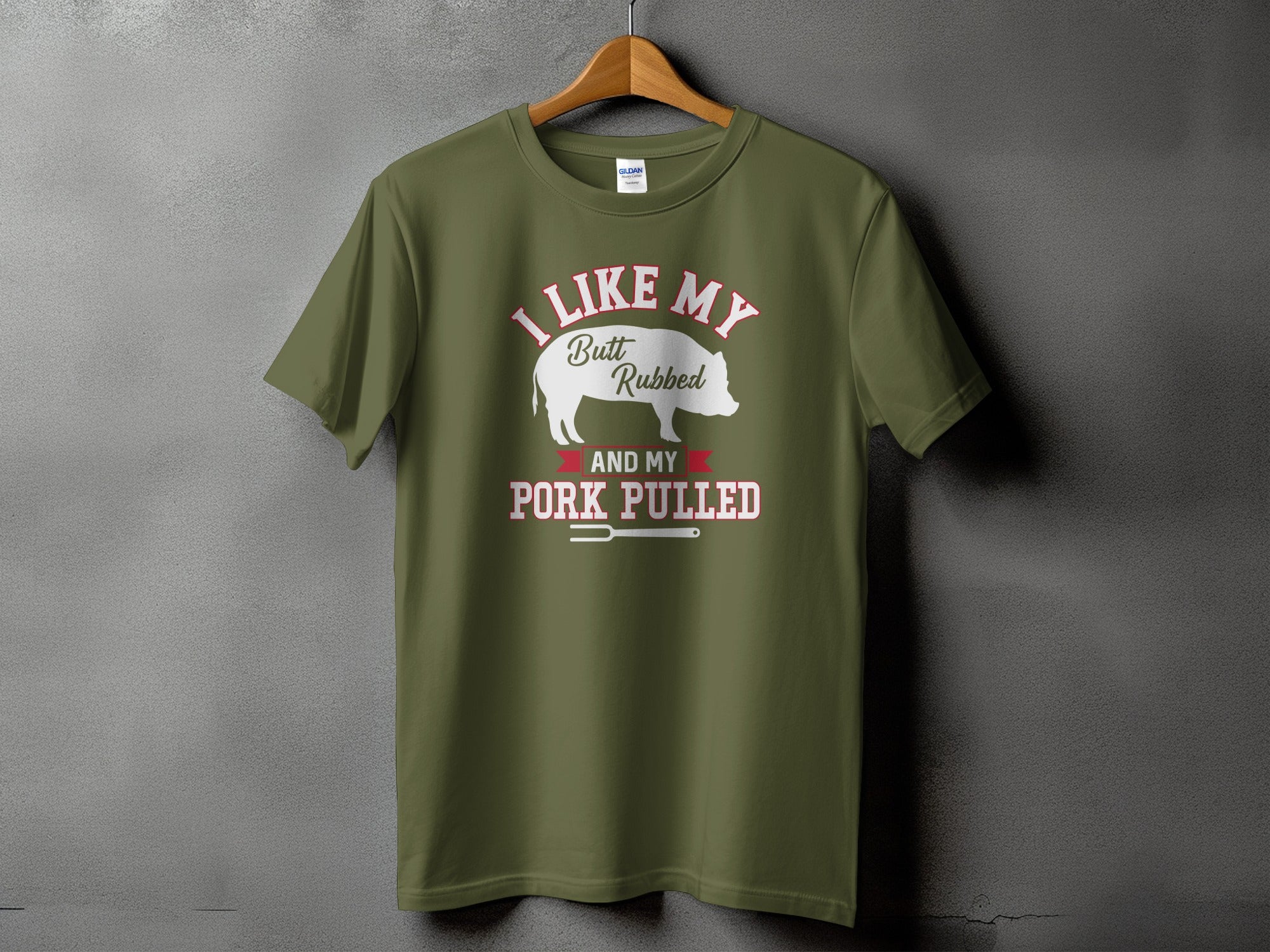 Green t-shirt with text "I LIKE MY Butt Rubbed AND MY PORK PULLED".