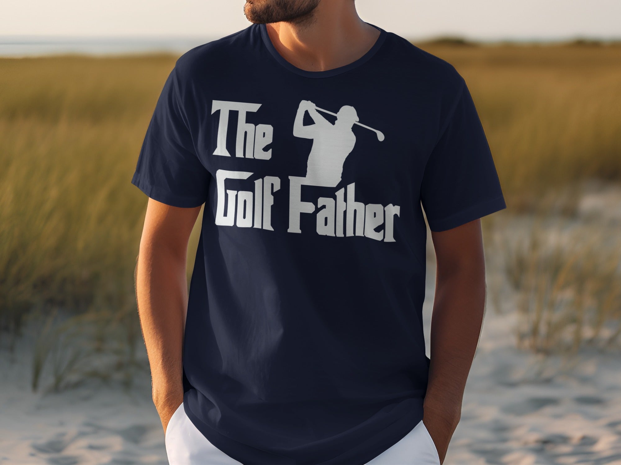 Dark blue t-shirt with white text and graphic that reads "The Golf Father".