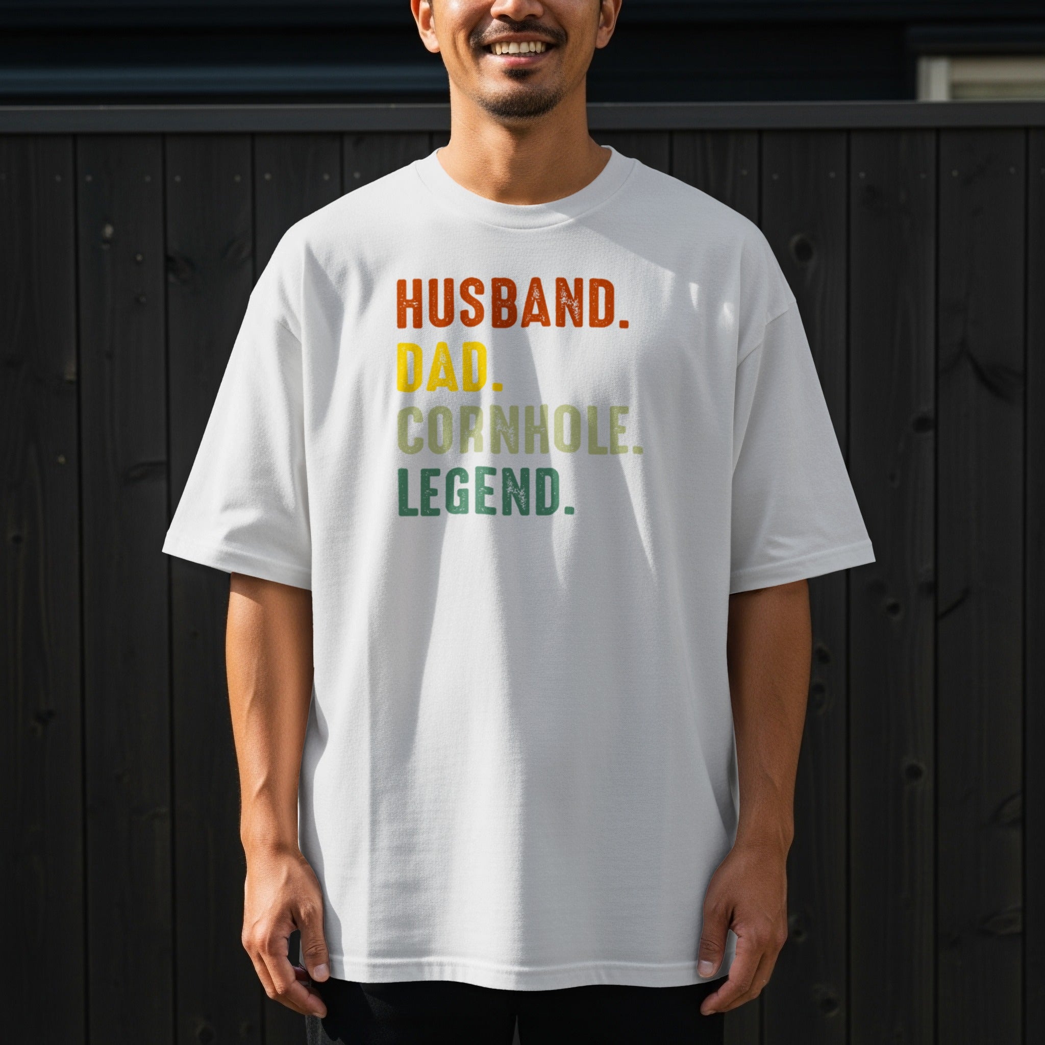 White t-shirt with text: Husband. Dad. Cornhole. Legend.