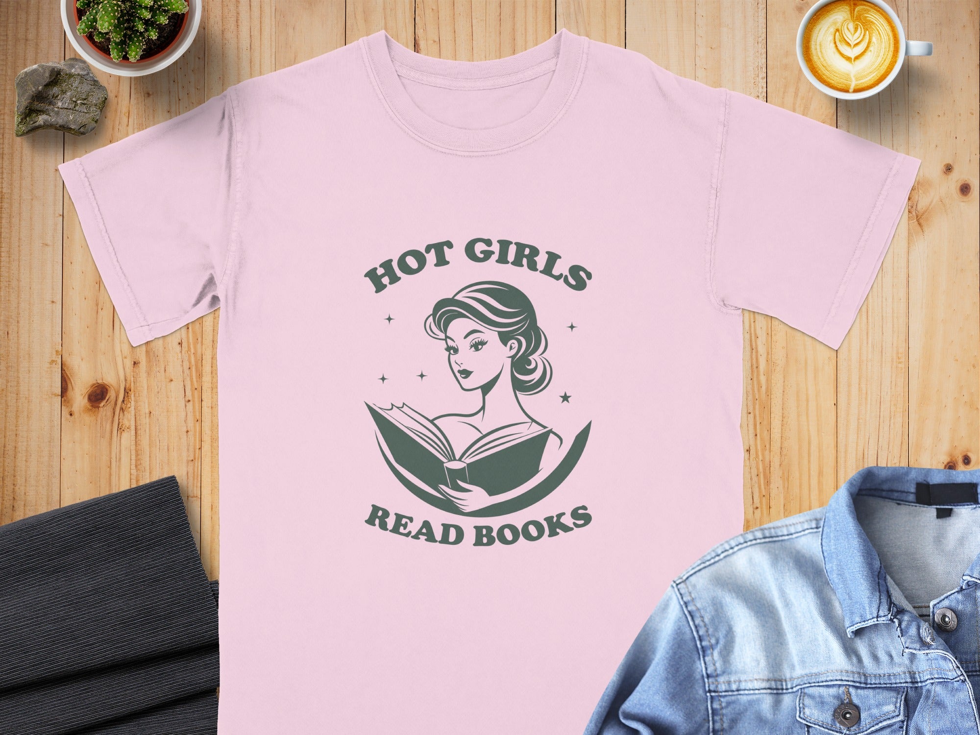 Pink t-shirt with green text "Hot Girls Read Books" and woman reading.