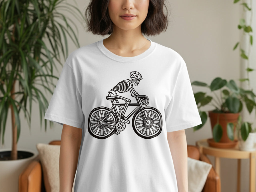 White t-shirt with black graphic of a skeleton riding a bicycle.