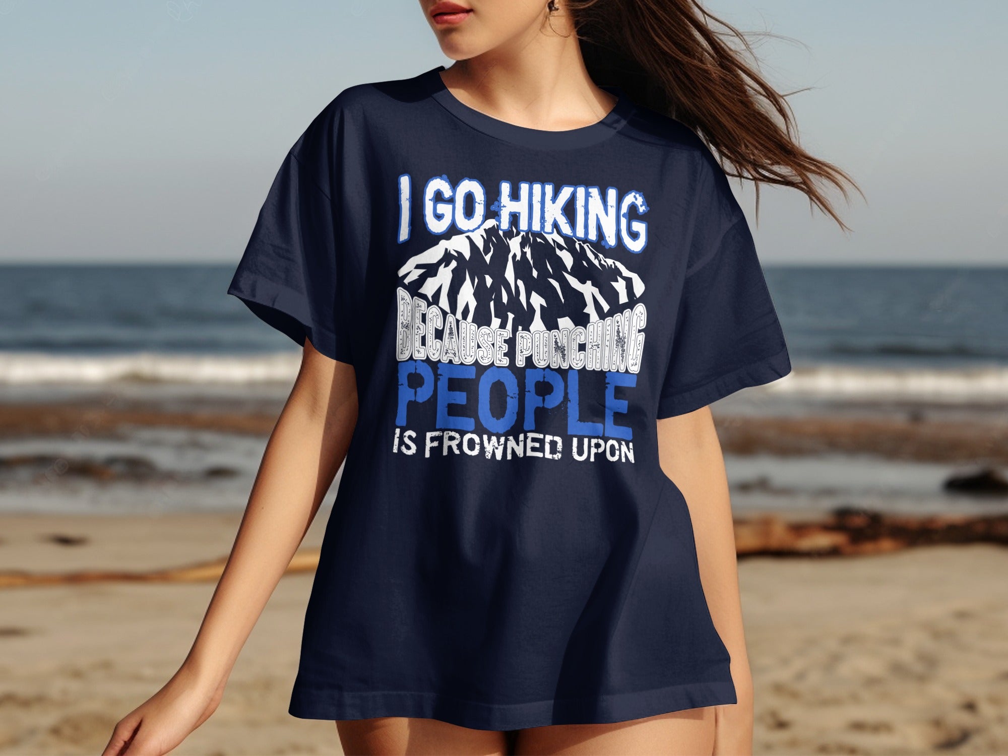 Navy t-shirt with "I GO HIKING BECAUSE PUNCHING PEOPLE IS FROWNED UPON" text.