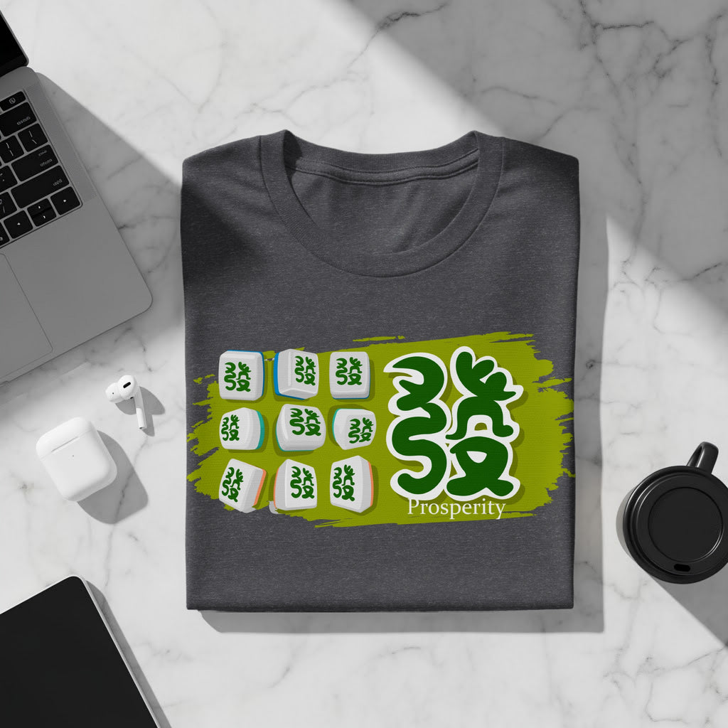 Dark t-shirt with a green abstract background and mahjong tiles spelling "Prosperity".