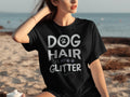 Black t-shirt with "DOG HAIR IS MY GLITTER" text and paw prints.