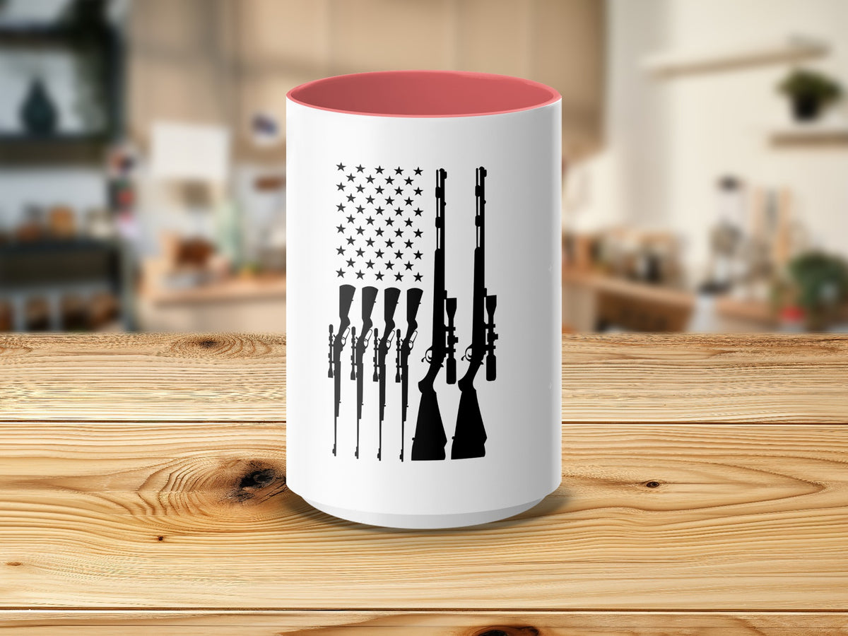 White mug with American flag design featuring silhouettes of rifles and pink interior.