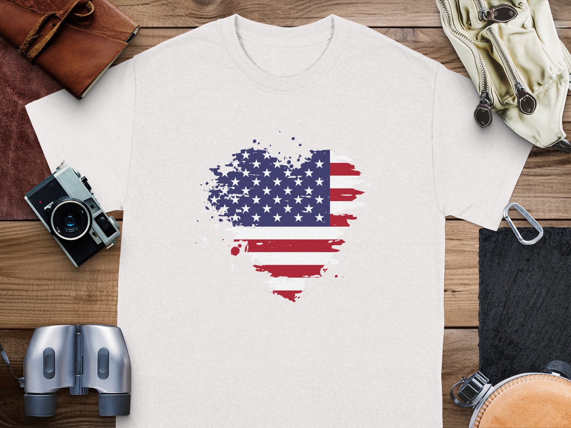 White t-shirt with a distressed American flag design in a heart shape.