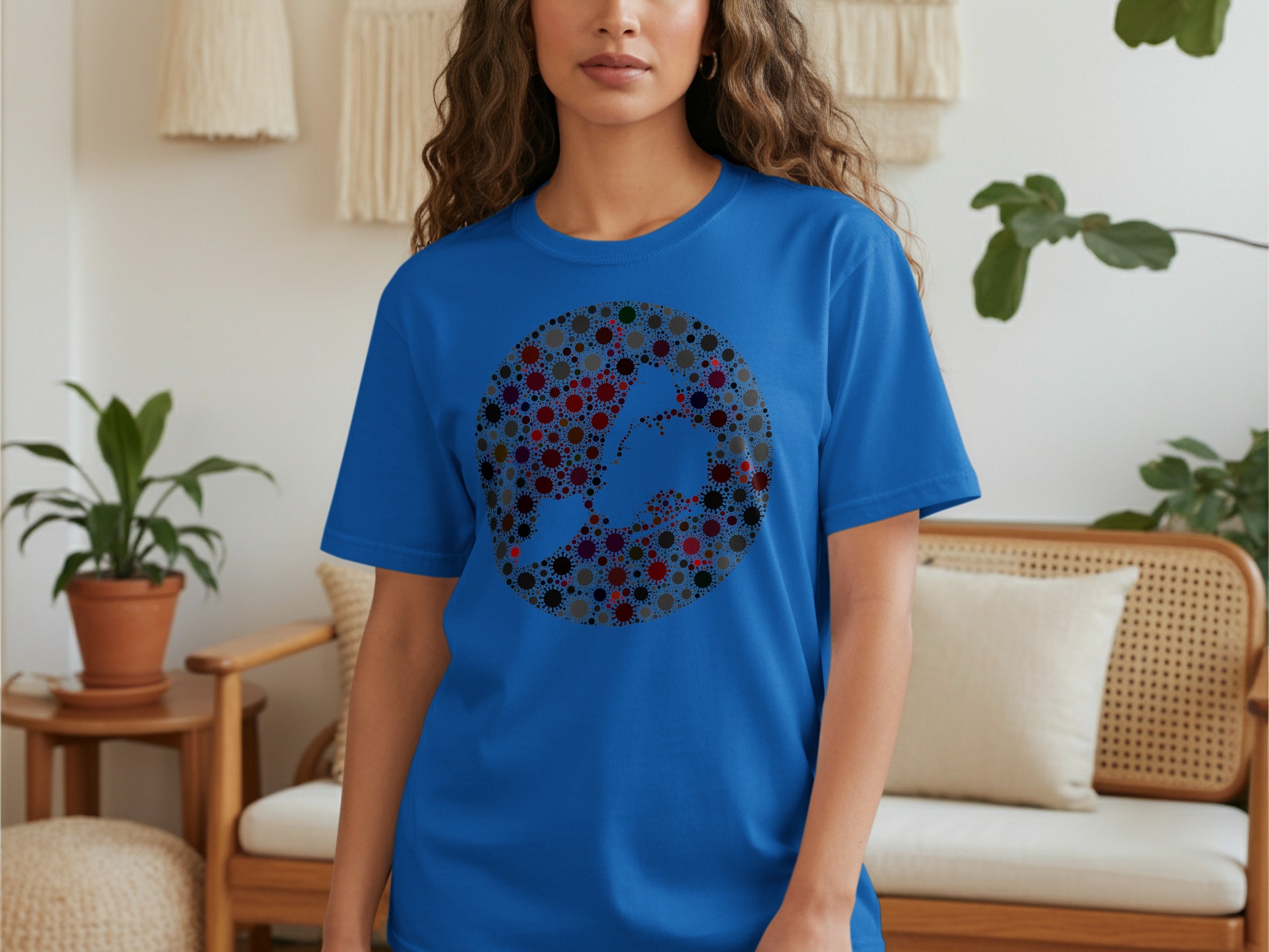 Blue t-shirt with circular virus cell pattern forming a silhouette.