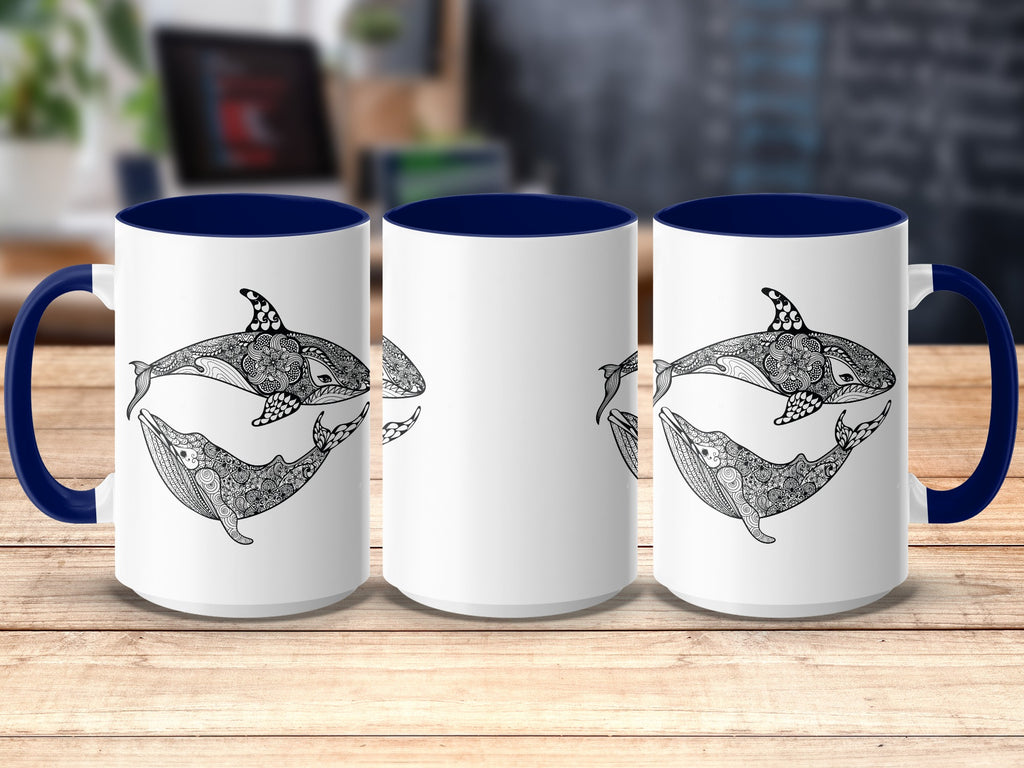 Three white mugs with blue handles display black and white mandala-style orca and whale designs.