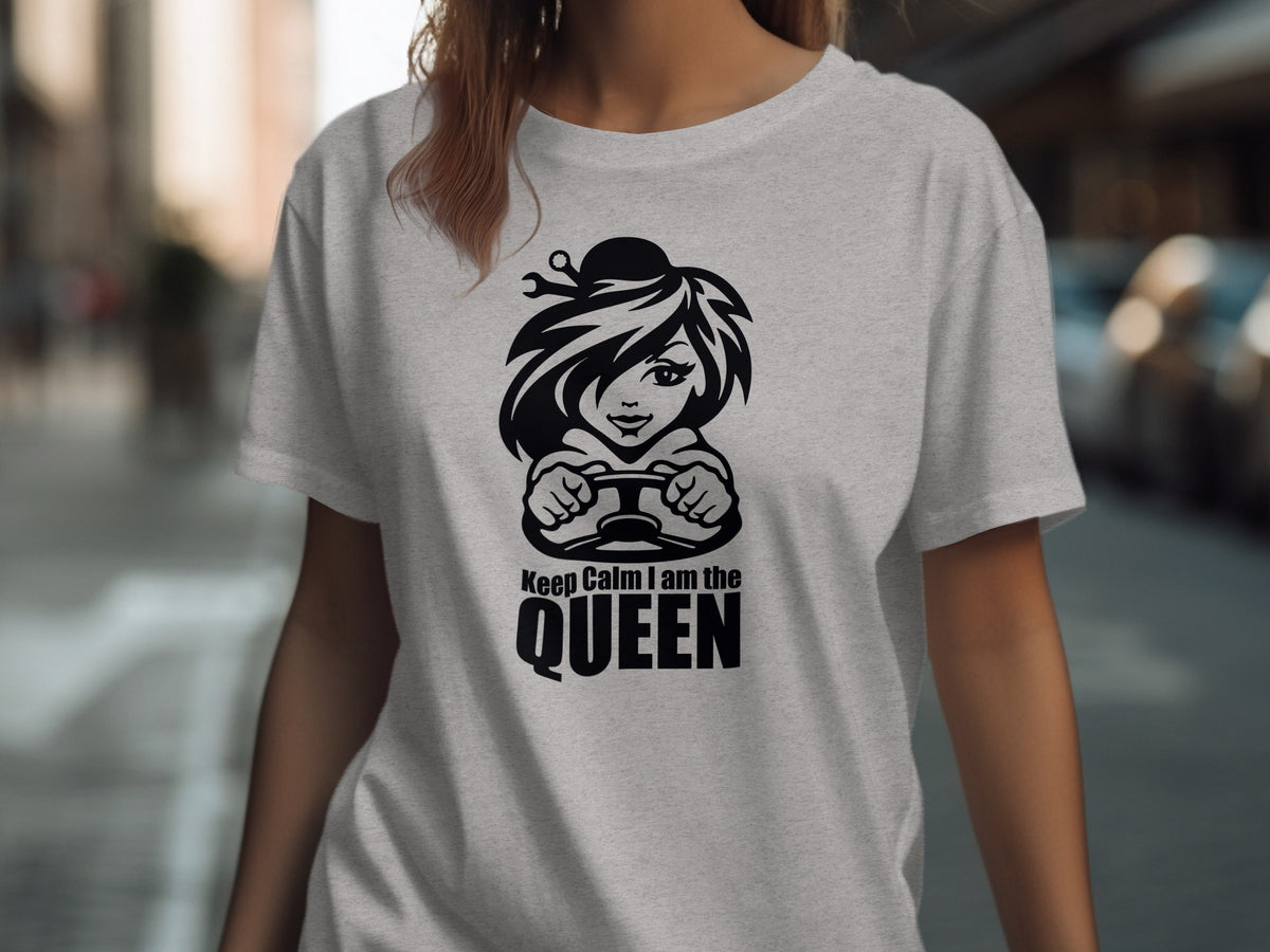 Grey t-shirt with black graphic of a woman driving, saying "Keep Calm I am the QUEEN".