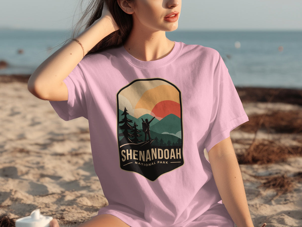 Shenandoah National Park graphic on a pink t-shirt with mountains and hiker.