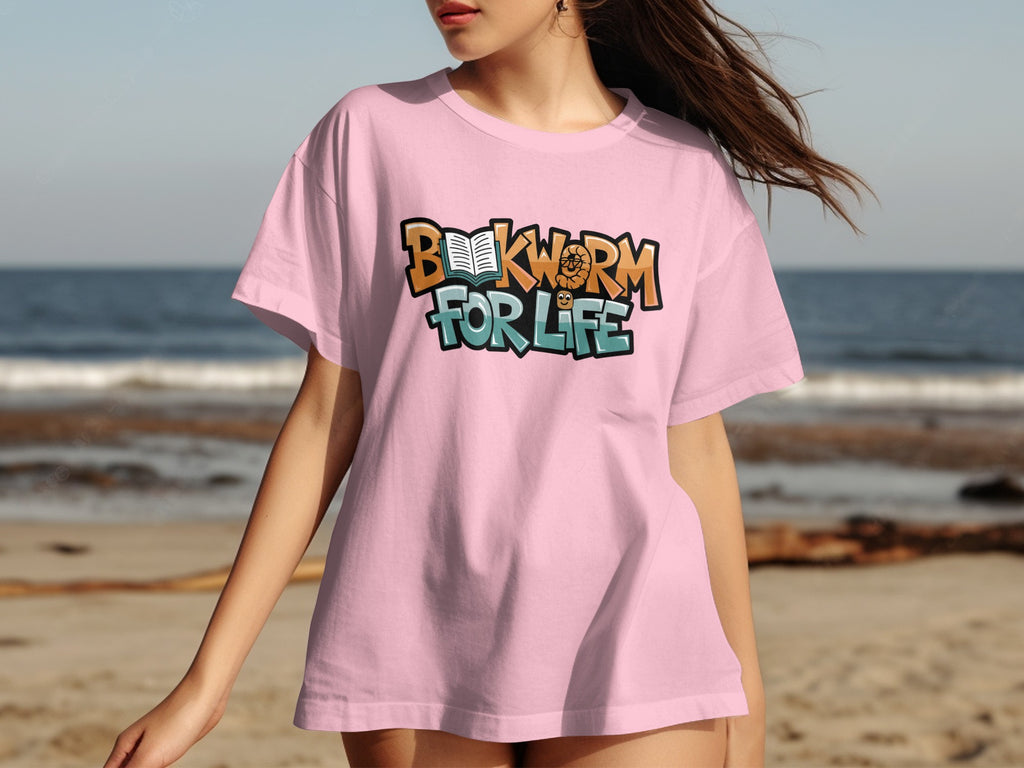 Pink t-shirt with text "BOOKWORM FOR LIFE" and cartoon illustrations.