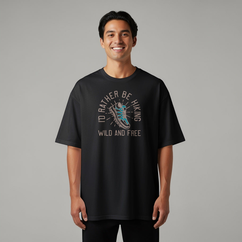Black t-shirt featuring hiking boot graphic with text "I'd Rather Be Hiking Wild and Free."