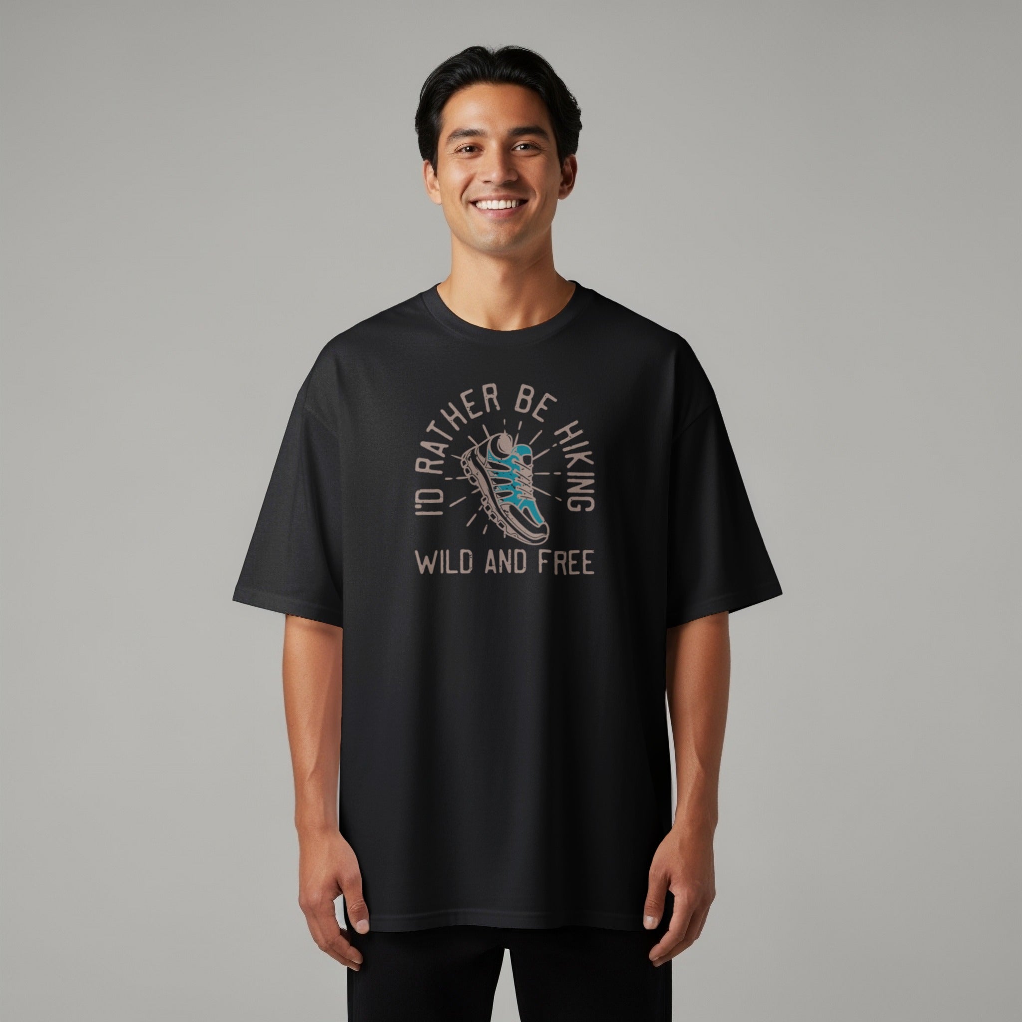 Black t-shirt featuring hiking boot graphic with text "I'd Rather Be Hiking Wild and Free."