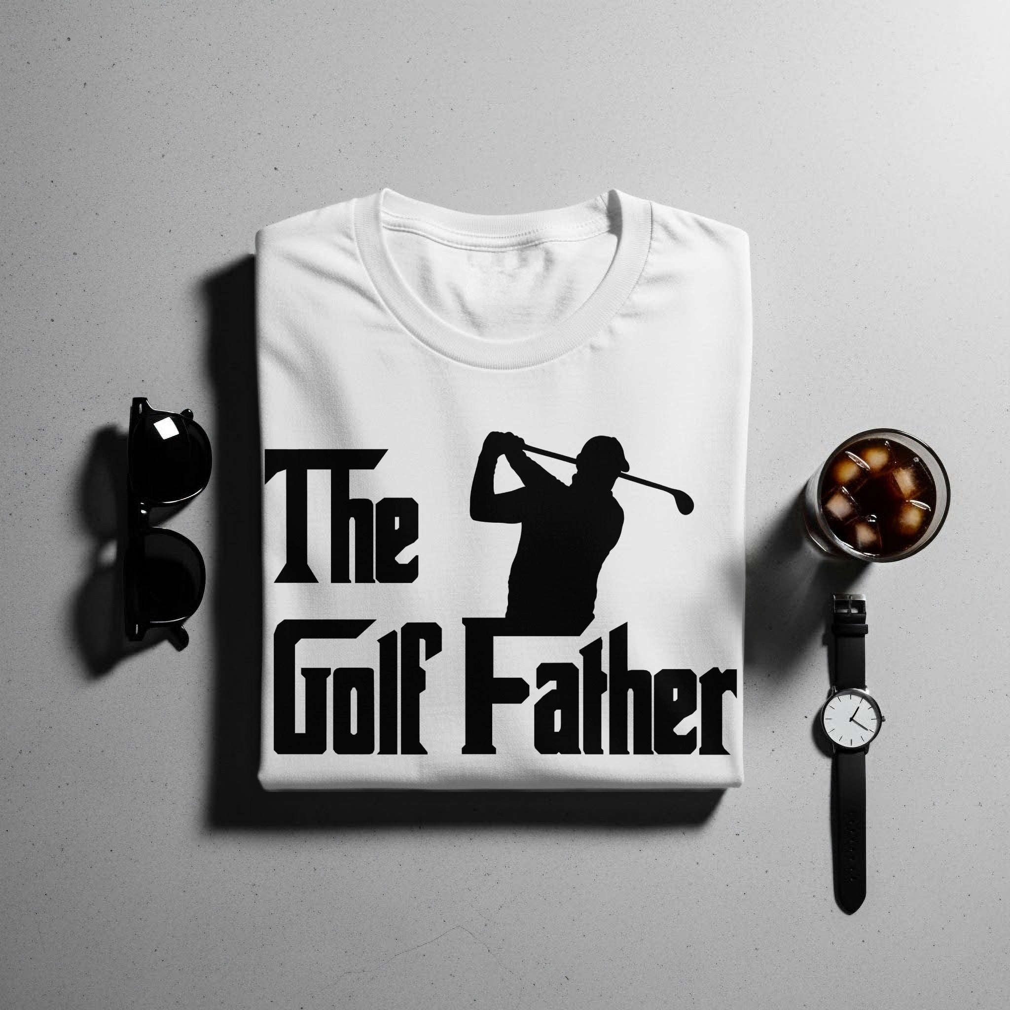White t-shirt with "The Golf Father" text and golfer silhouette.