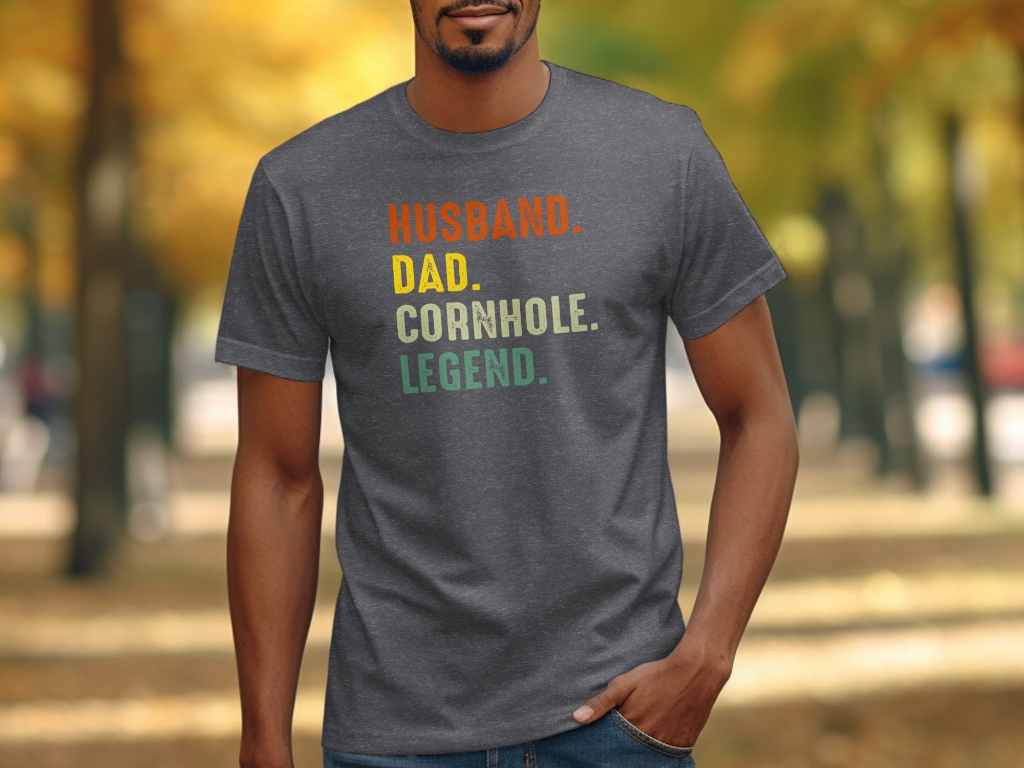 Dark grey t-shirt with text: Husband. Dad. Cornhole. Legend.