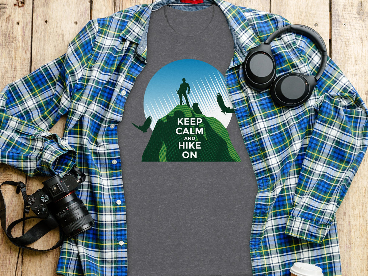 Dark grey t-shirt with "Keep Calm and Hike On" mountain graphic.