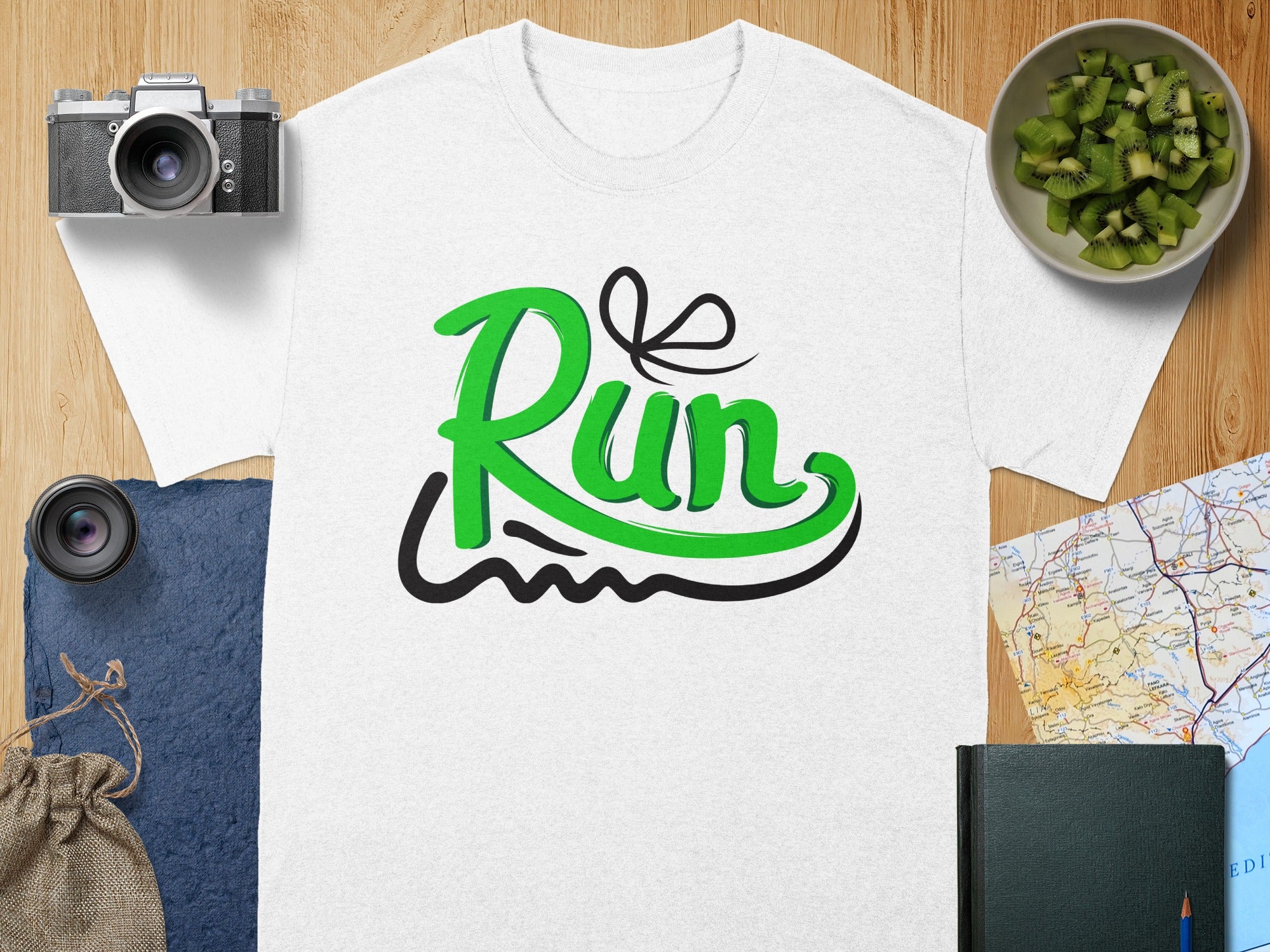 White t-shirt with green "Run" text and black accents.