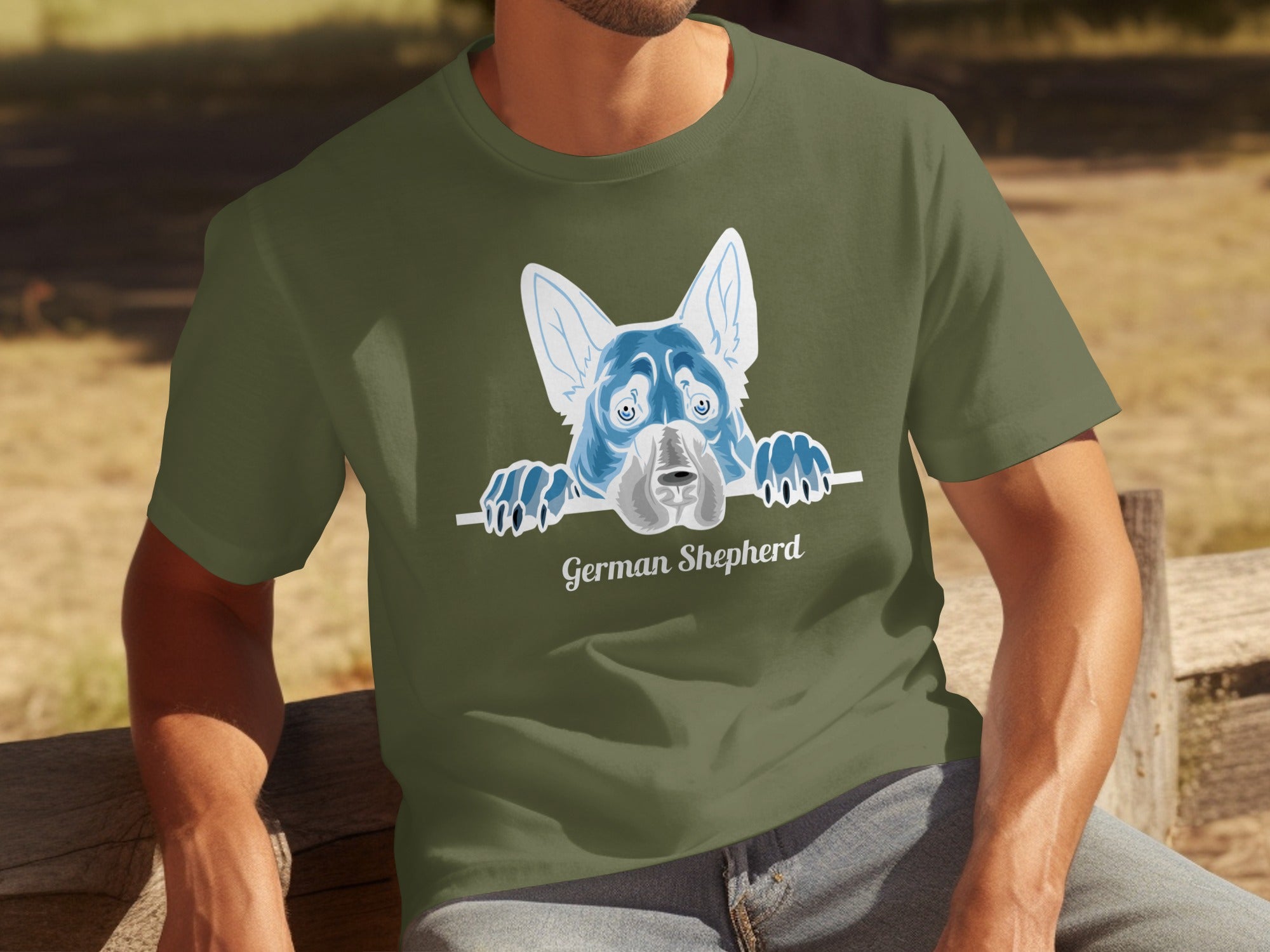 Olive green t-shirt with stylized blue and gray German Shepherd graphic and text.