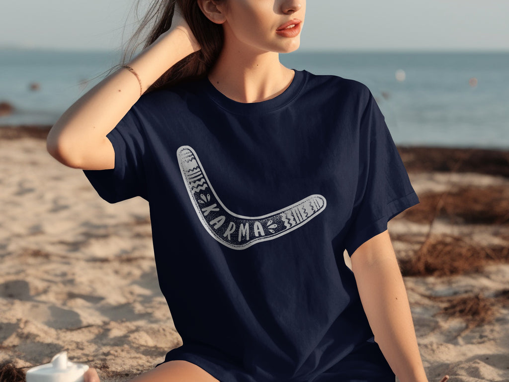 Navy t-shirt with white boomerang graphic and the word KARMA.