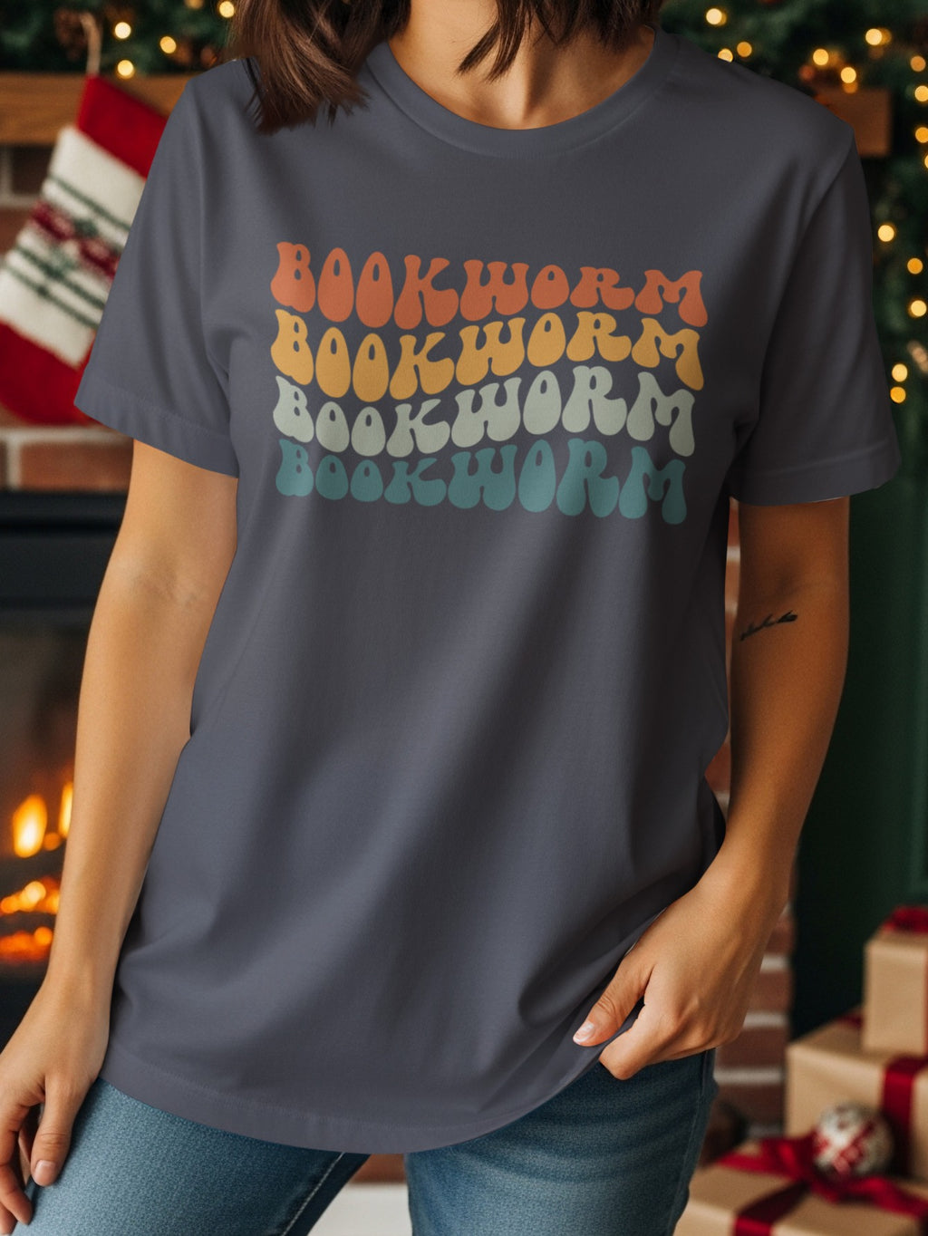 Gray t-shirt with retro "BOOKWORM" text in four pastel colors.