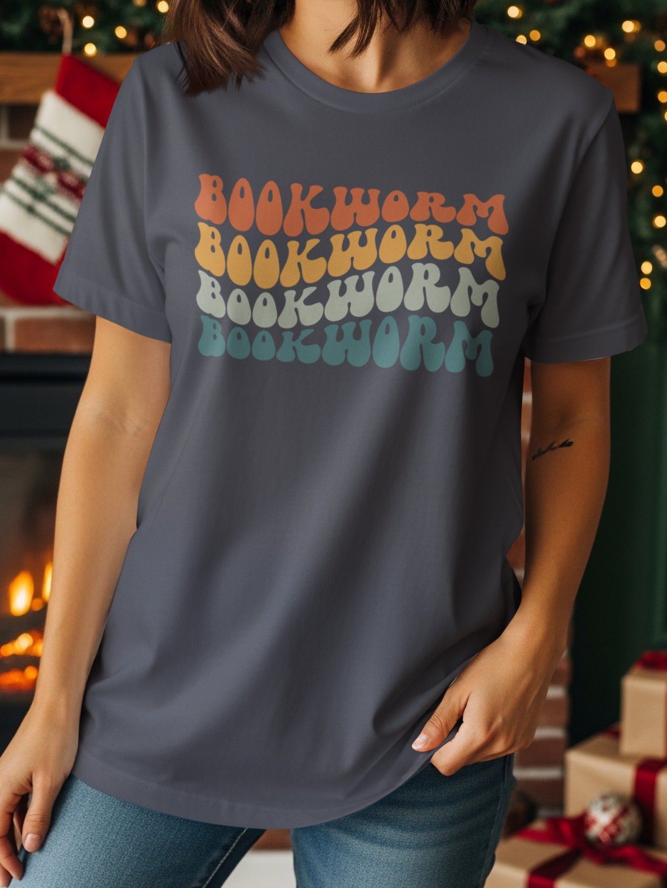 Gray t-shirt with retro "BOOKWORM" text in four pastel colors.