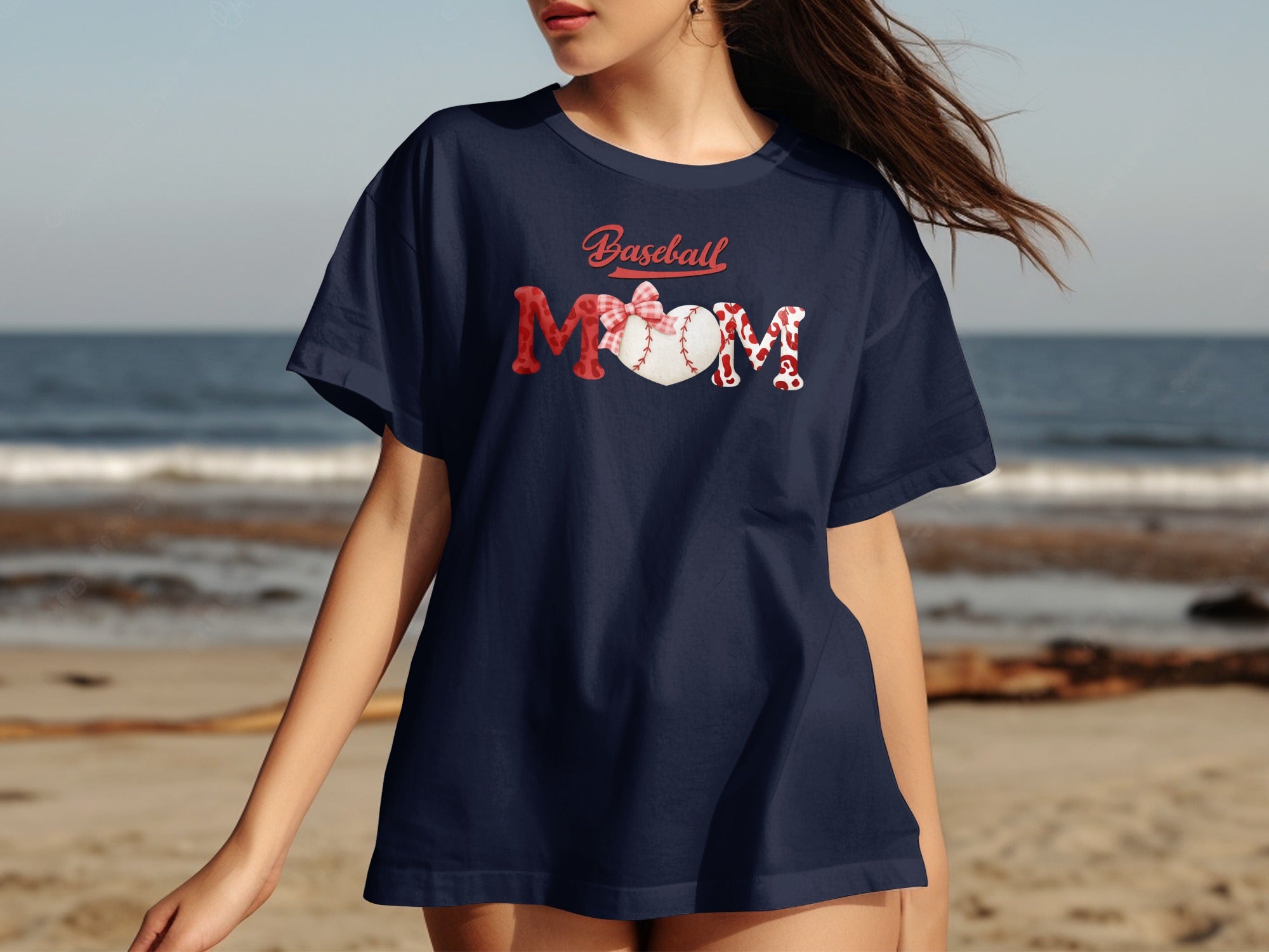 Navy t-shirt with "Baseball Mom" graphic featuring baseball heart and red accents.
