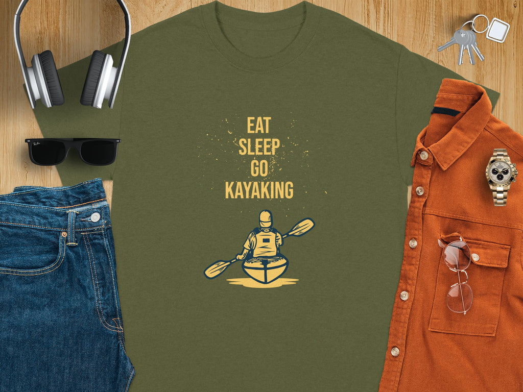 Green t-shirt with "Eat Sleep Go Kayaking" text and kayaker graphic.