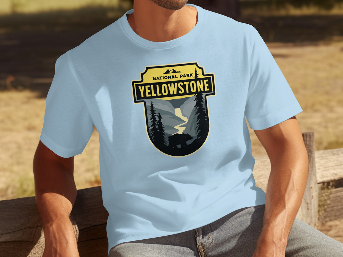 Light blue t-shirt featuring Yellowstone National Park badge with bear and landscape graphic.