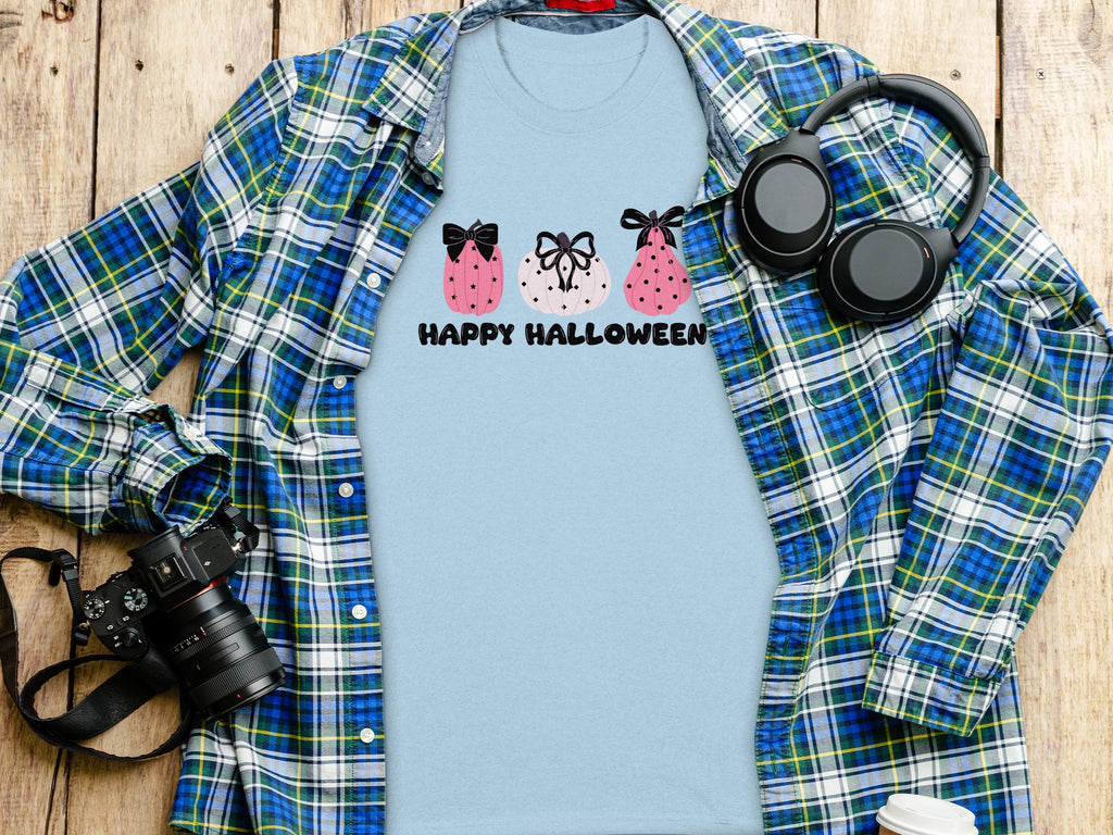 Light blue t-shirt with pumpkins and "Happy Halloween" text.