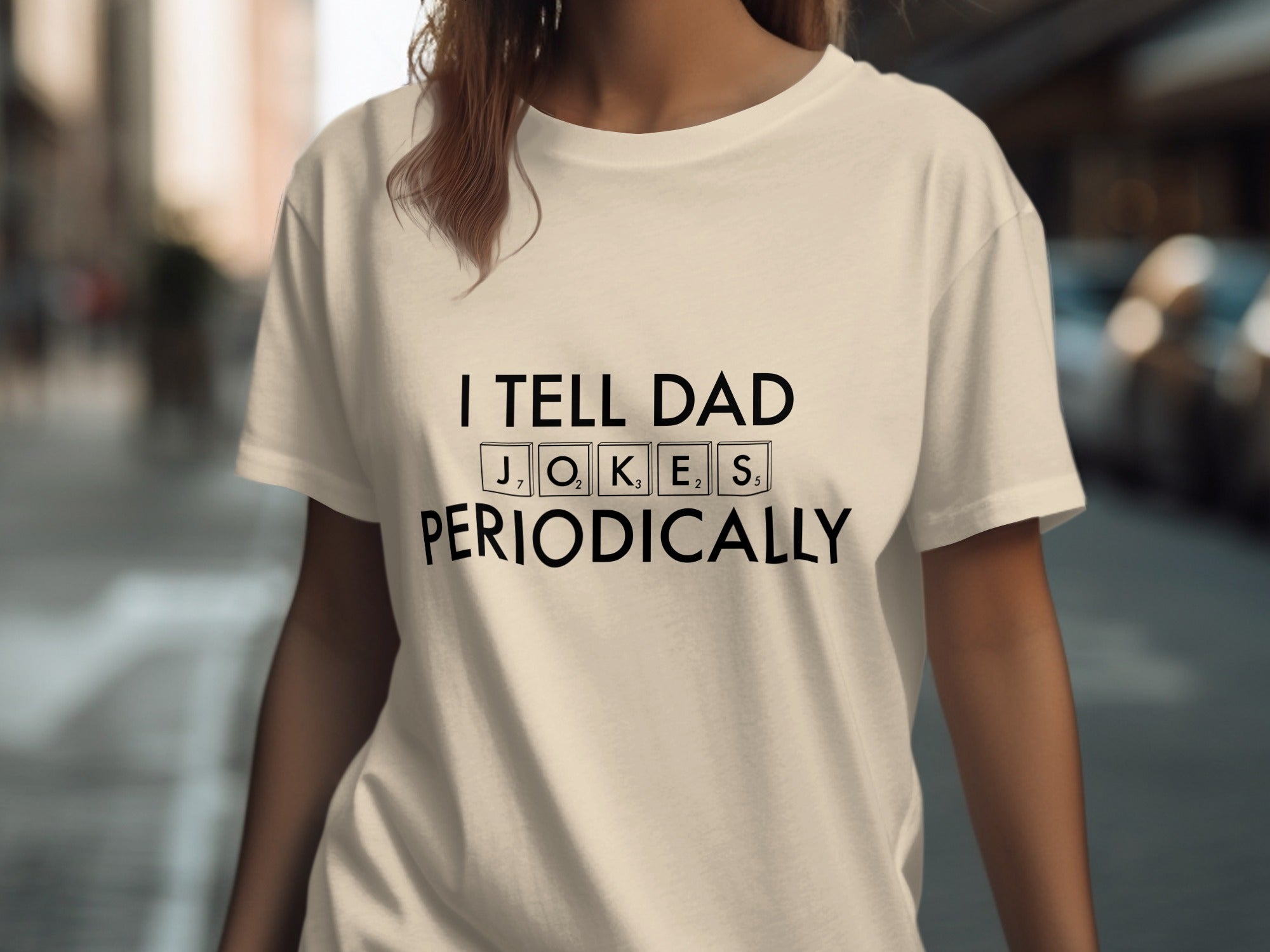 Cream t-shirt with "I TELL DAD JOKES PERIODICALLY" text and Scrabble tiles.
