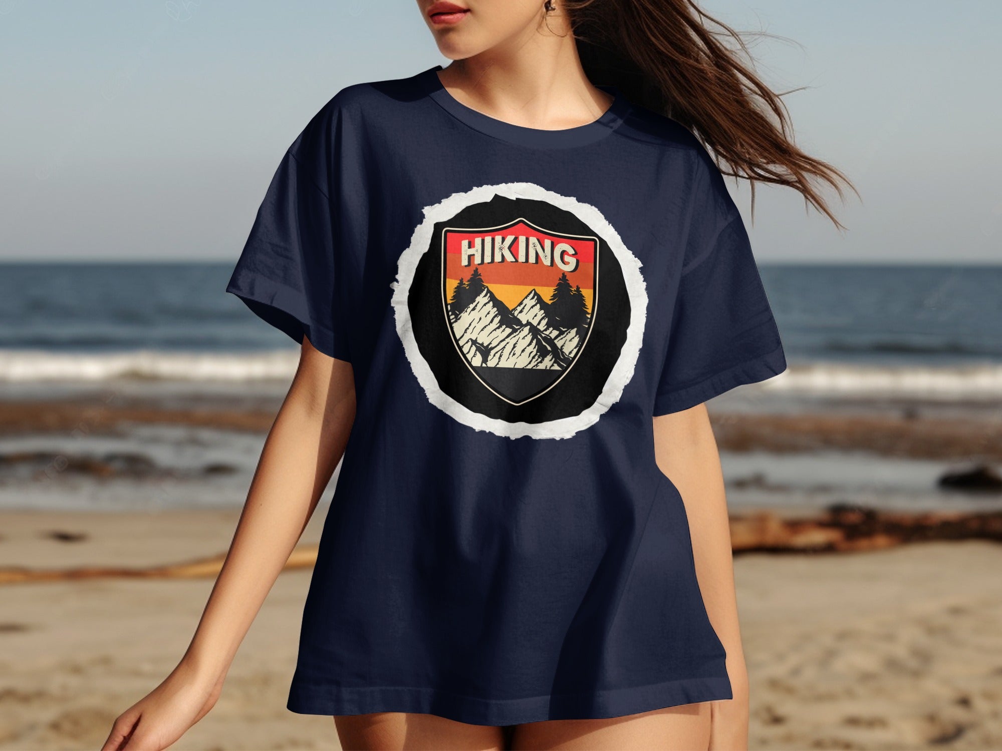 Navy t-shirt with "HIKING" emblem featuring mountains and trees.