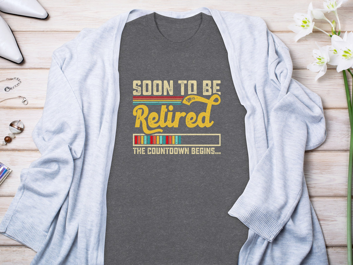 Dark gray t-shirt with "Soon to be Retired" and a countdown bar.