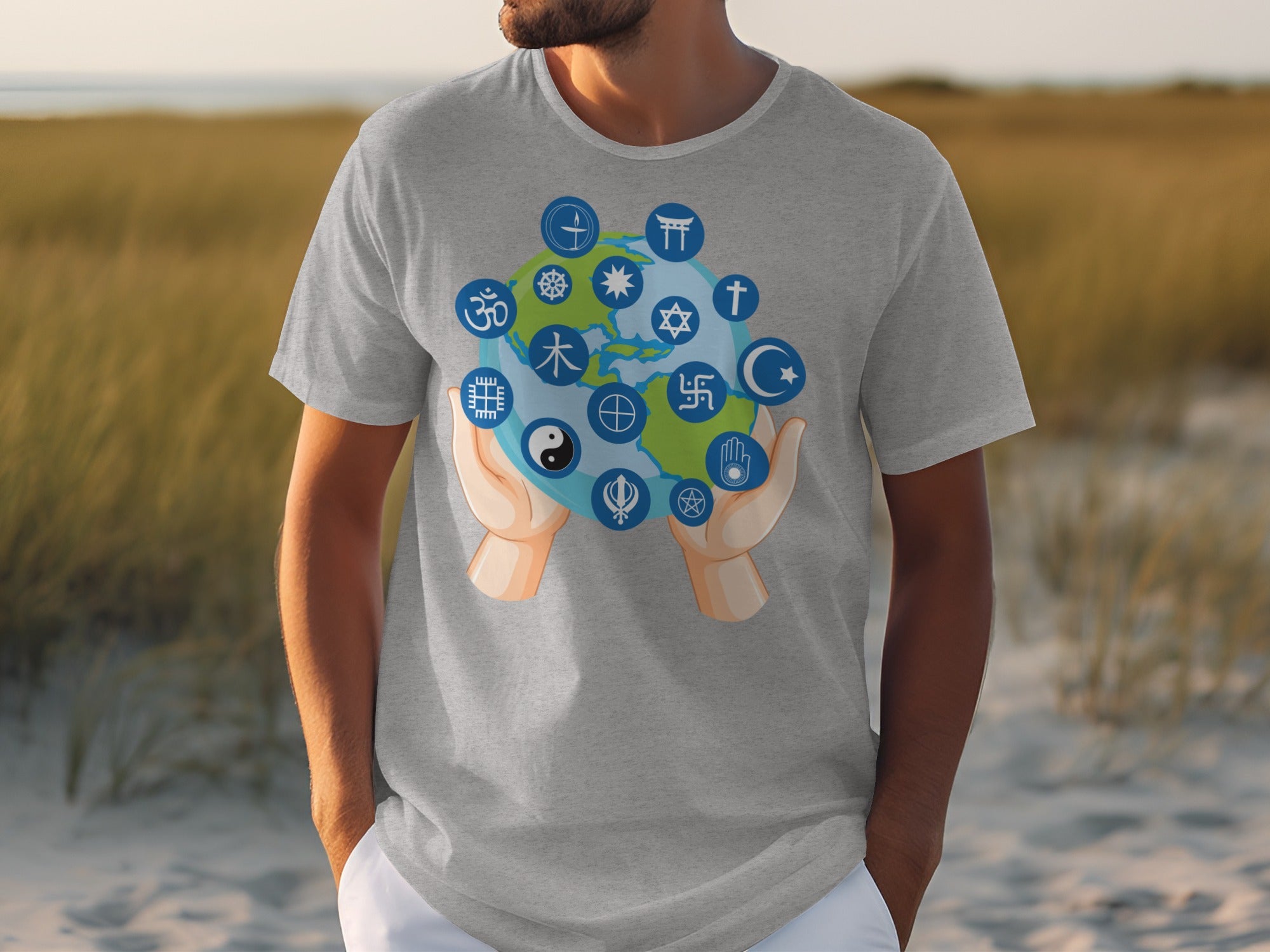 Gray t-shirt with diverse religious and cultural symbols around a globe.