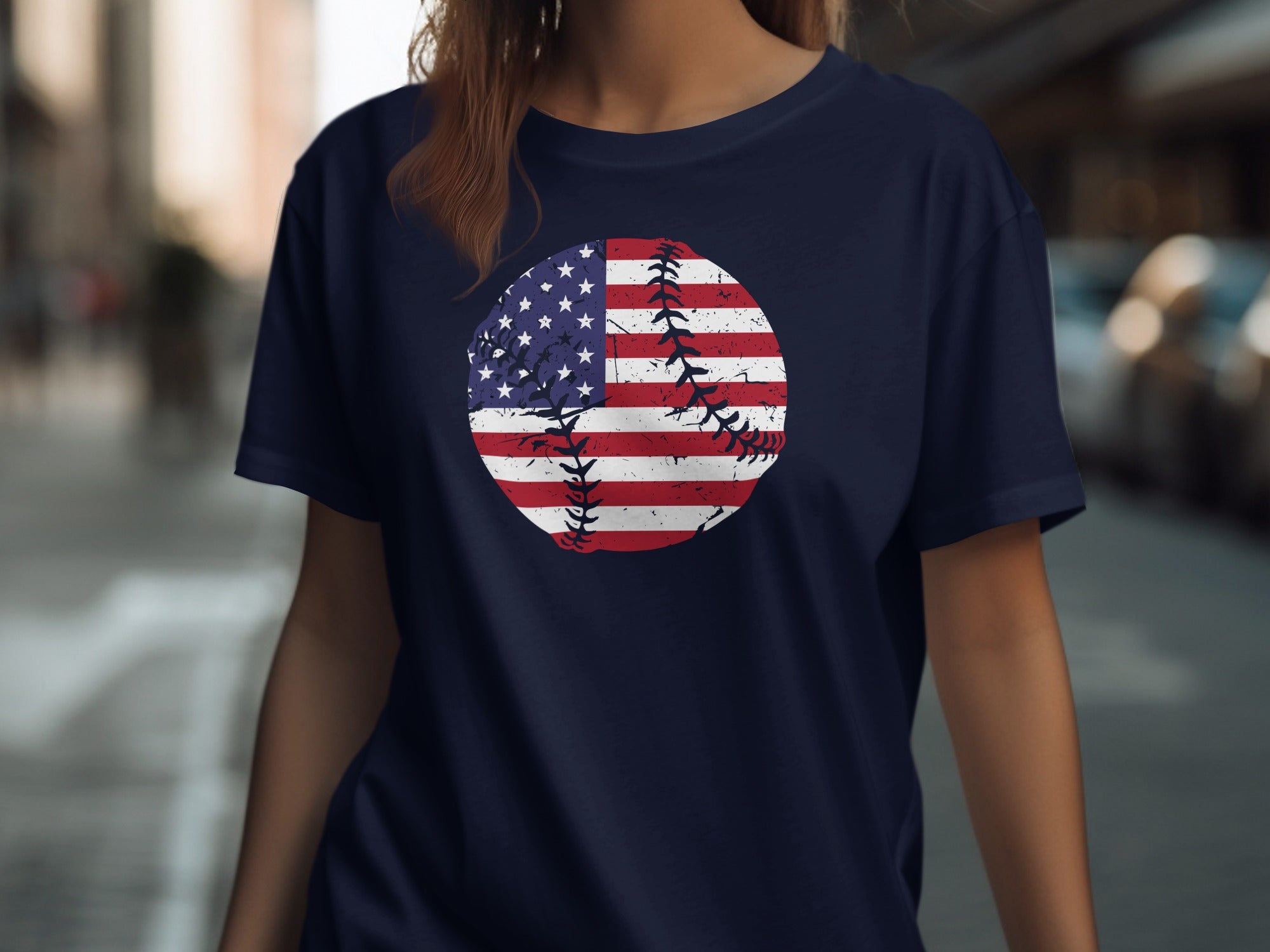 Distressed American flag baseball graphic on a navy blue t-shirt.
