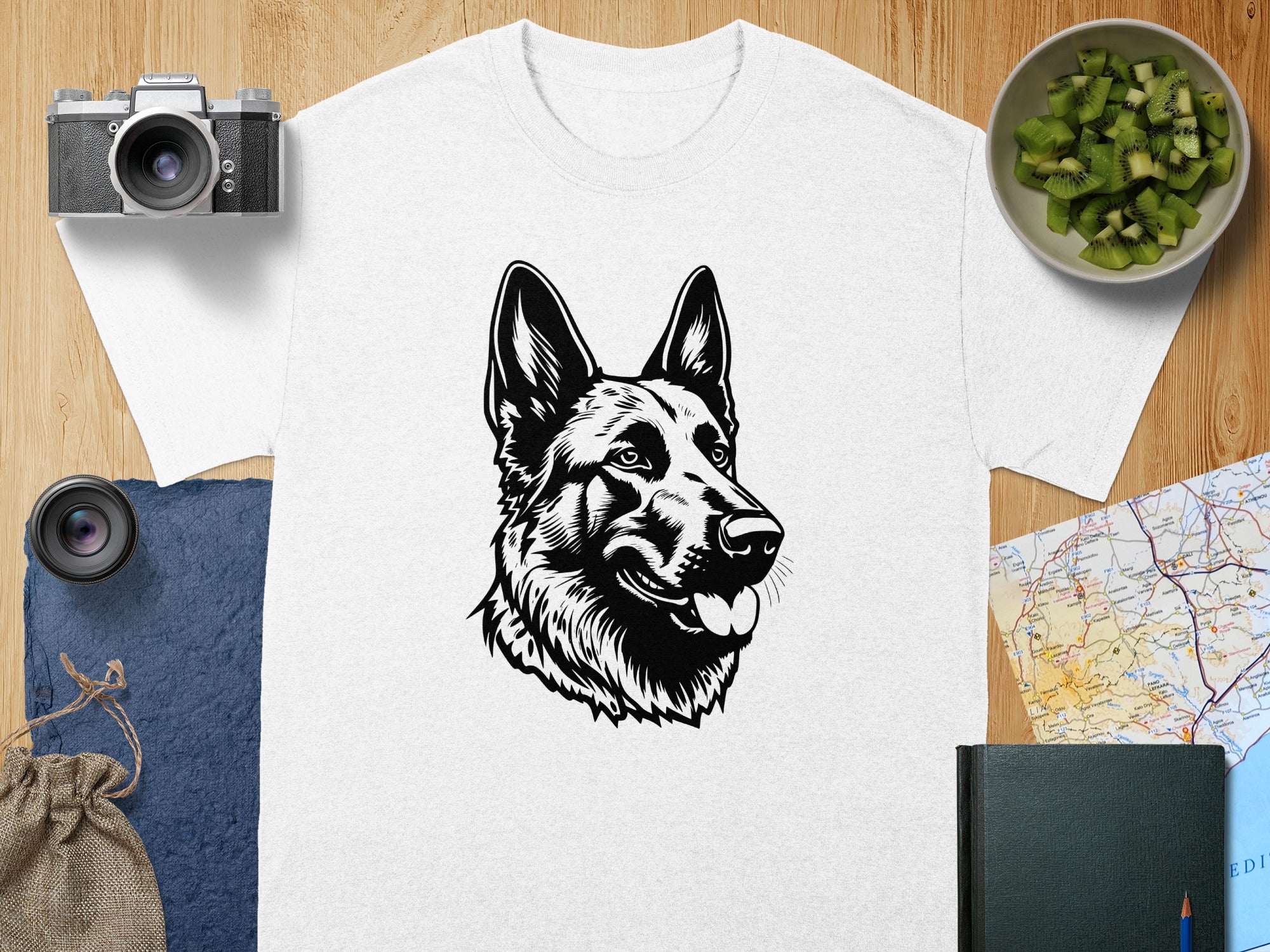 White t-shirt with black German Shepherd graphic on the chest.