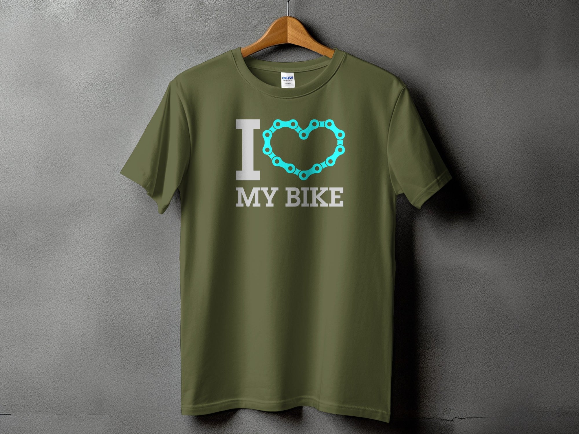 Olive green t-shirt with "I ♡ MY BIKE" graphic featuring a bicycle chain heart.