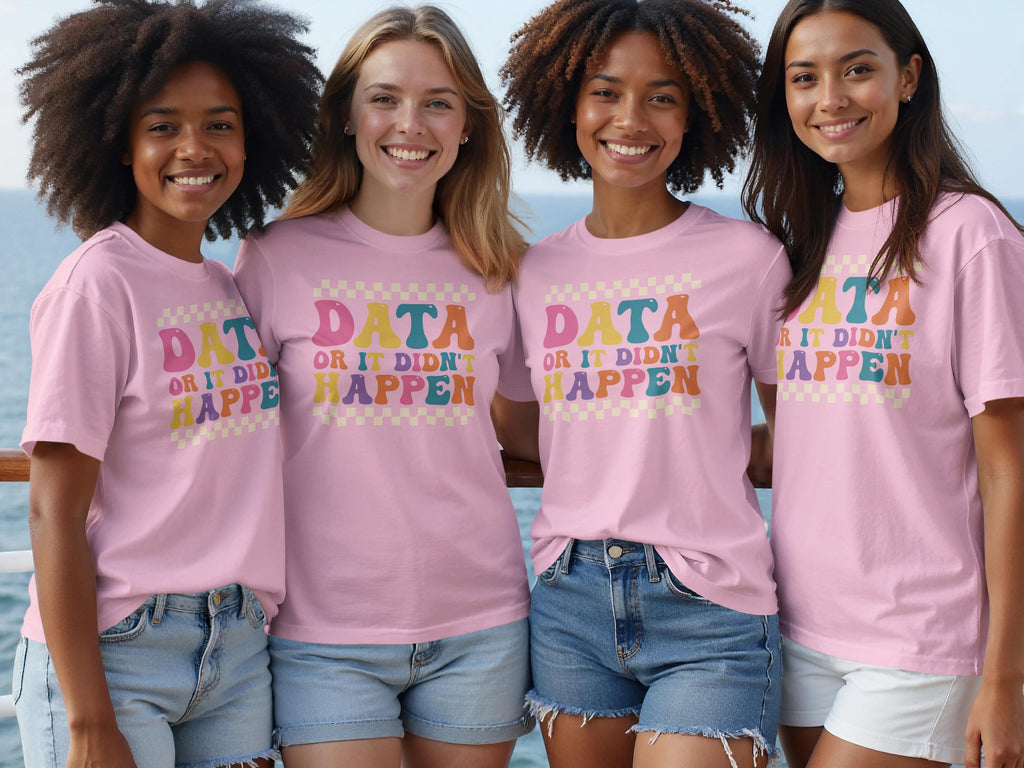Four women wear pink t-shirts with "DATA OR IT DIDN'T HAPPEN" in colorful, retro font.