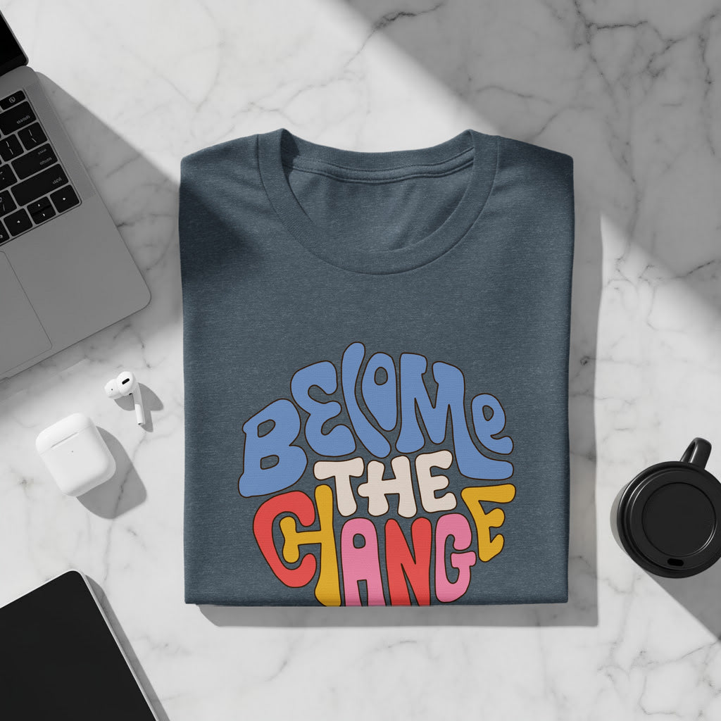 T-shirt with "BE THE CHANGE" text in a retro, colorful font.