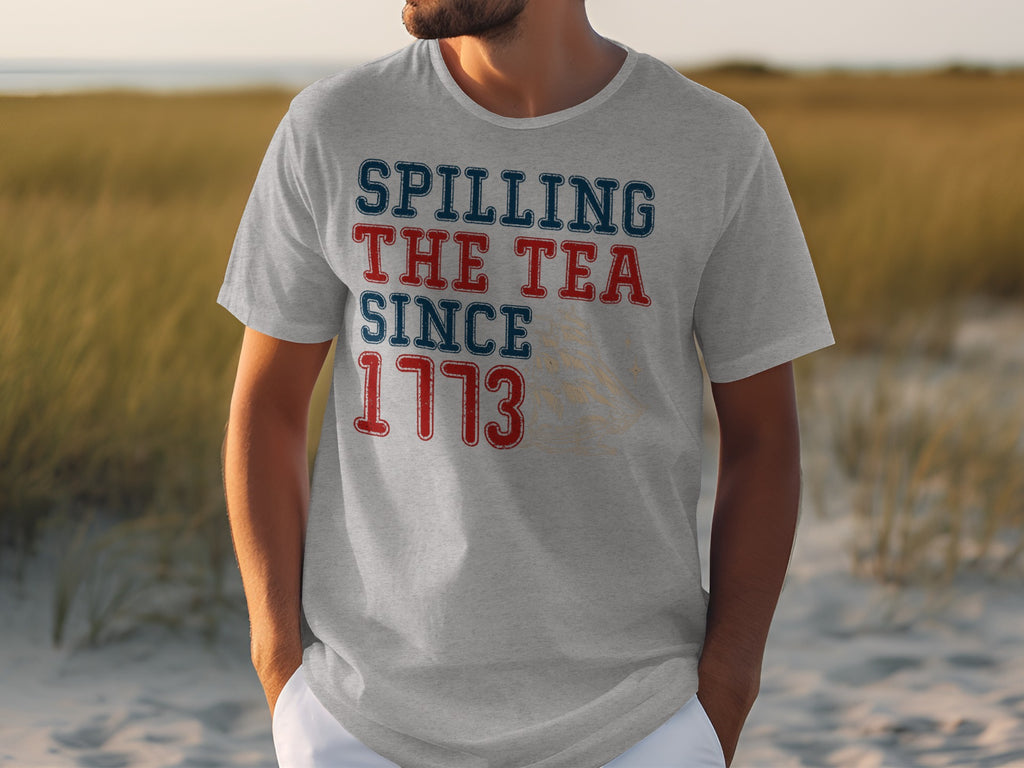 Gray t-shirt with "Spilling The Tea Since 1773" text design.