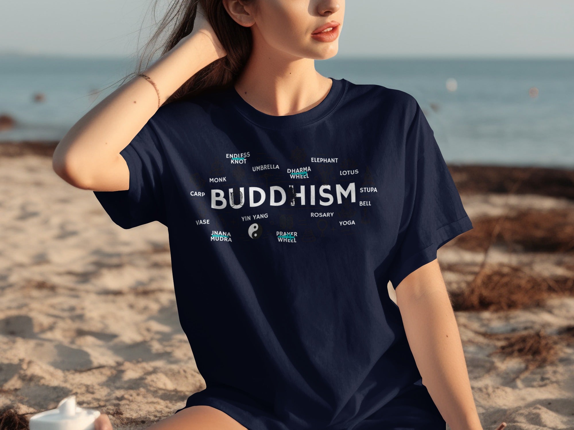 Navy t-shirt with "BUDDHISM" and related words.