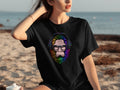 Black t-shirt with a colorful Bigfoot wearing headphones and glasses graphic.