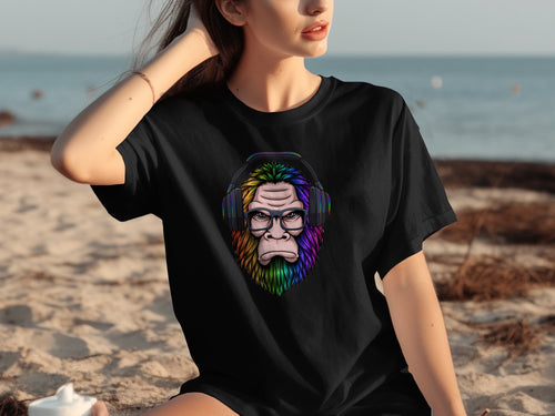 Black t-shirt with a colorful Bigfoot wearing headphones and glasses graphic.