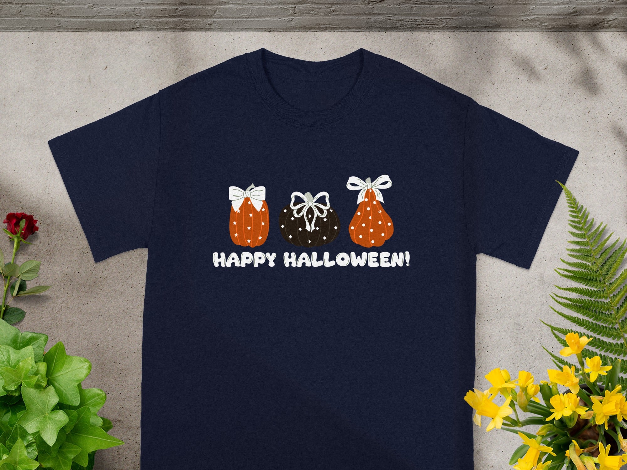 Navy t-shirt with three pumpkins and "Happy Halloween!" text.