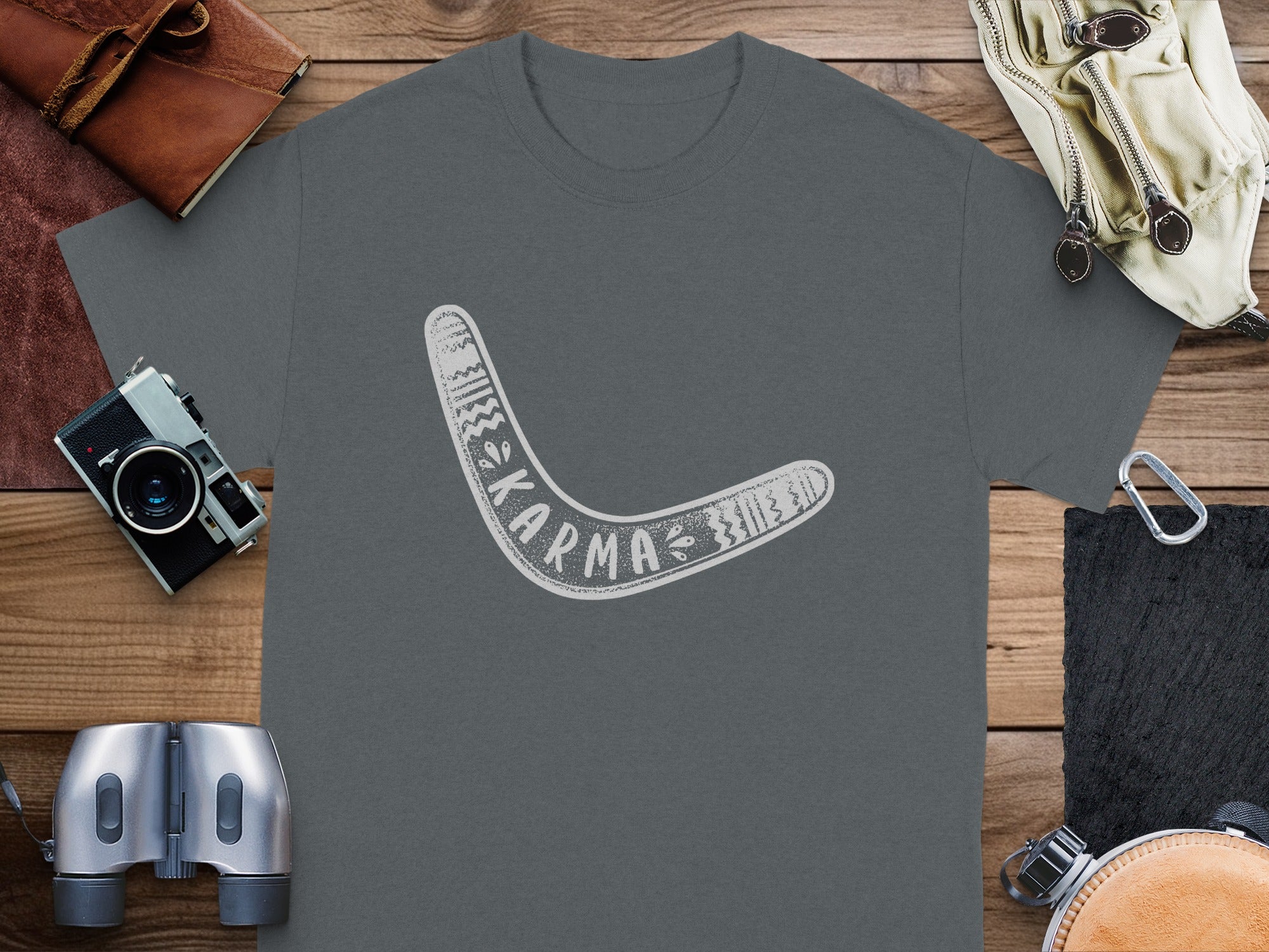 Dark gray t-shirt with white boomerang graphic and the word "Karma".